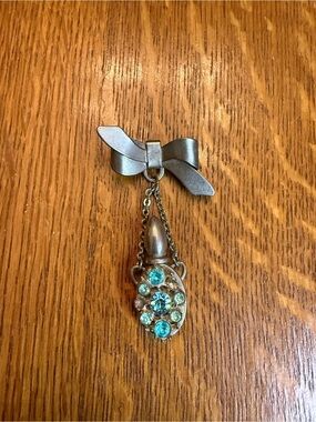 Vintage-Inspired Silver Bow Drop Pin with Aqua Crystal Accents
